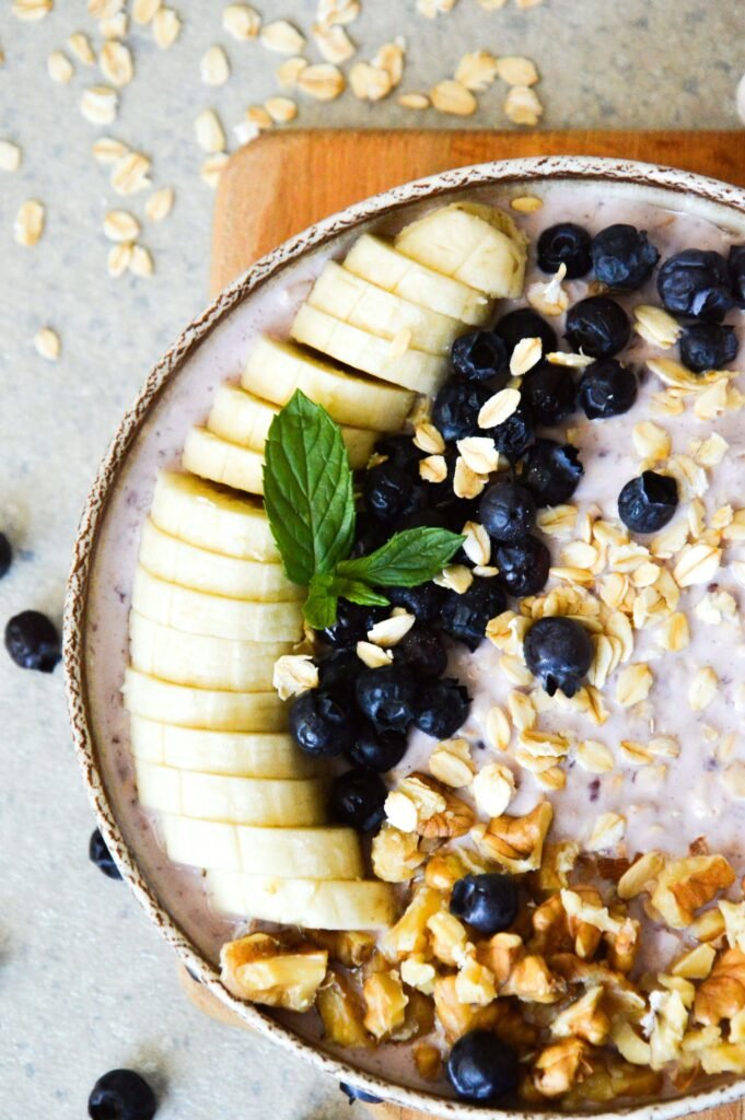 Sleep-friendly snacks like oats, bananas, and almonds help prevent night awakenings