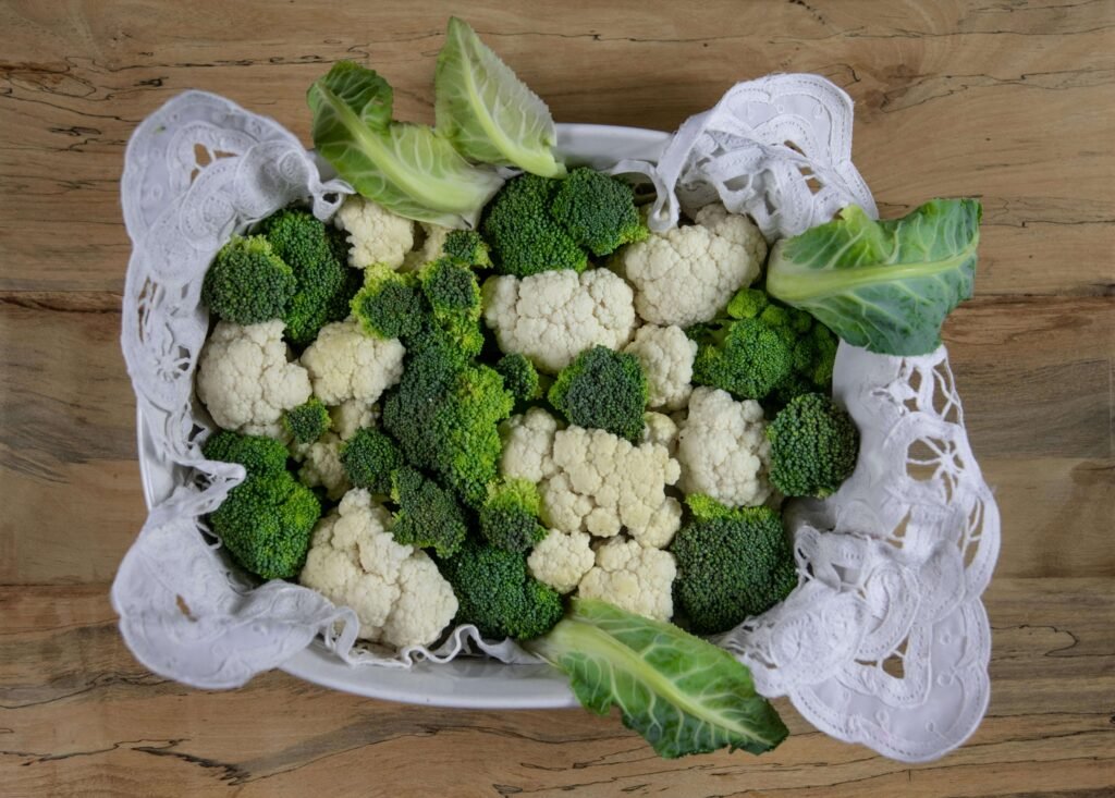 Broccoli and cauliflower on a cutting board