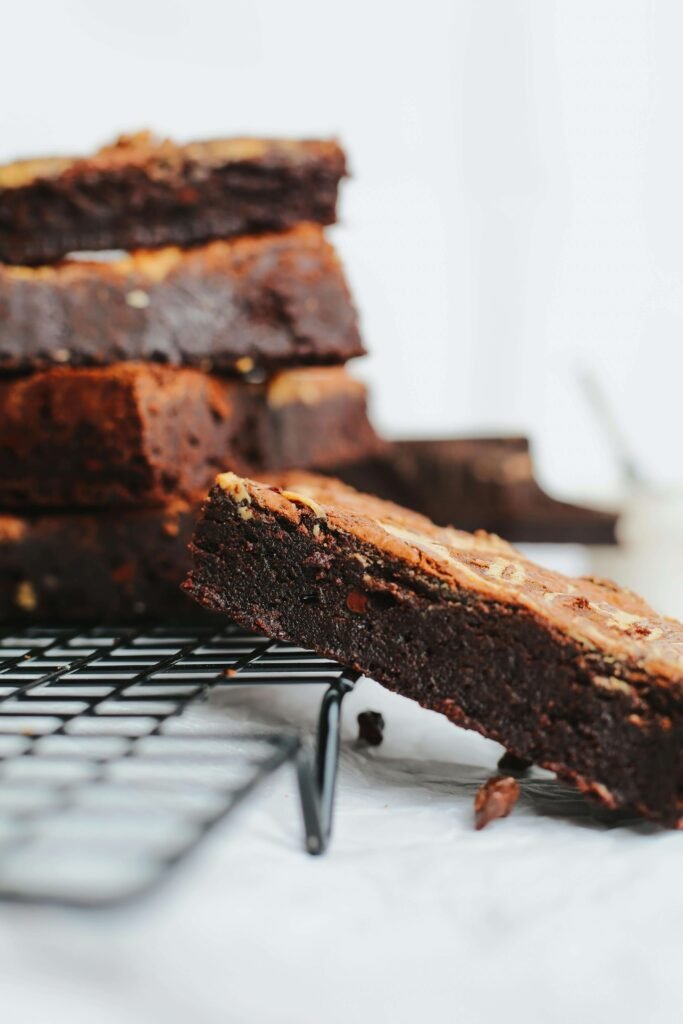 Oven-baked low calorie flourless brownies cooling in pan