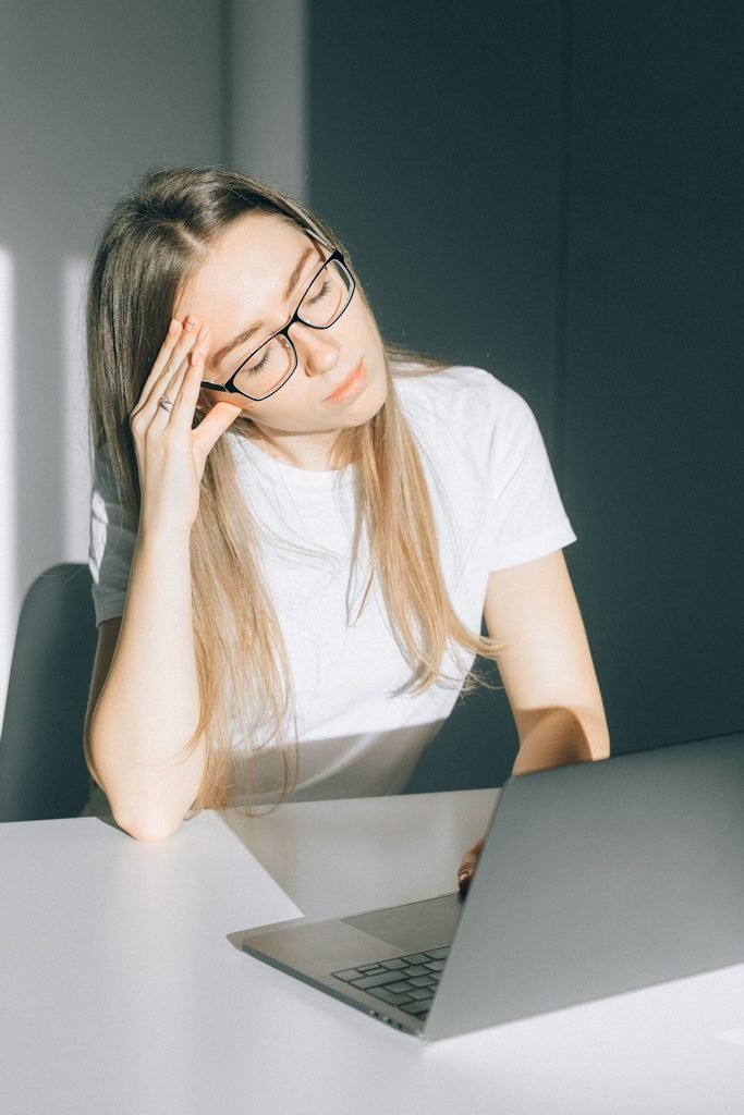 Woman experiencing fatigue and headache linked to possible folate deficiency